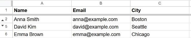 Google Sheets with rows hidden, showing arrows between row numbers where the hidden rows are